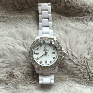 Toy watch. White with extra link smoke-free and pet free home. New with tag